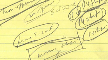 Doodles on yellow legal pad