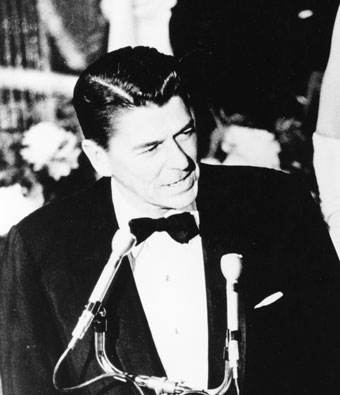 Ronald Reagan in tuxedo at microphone in 1967