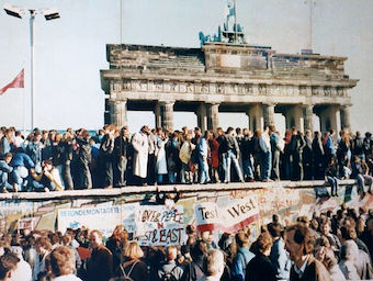 West and East Germans come together at the Brandenburg Gate, November 1989