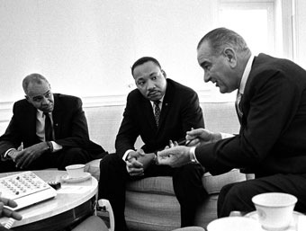 Three men talking