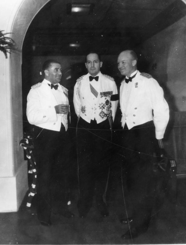 Captain T.J. Davis, General Douglas MacArthur, Major Dwight D. Eisenhower, in formal dress in Malacanang Palace in Manila, Philippines