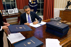 President Obama signing