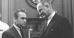 Alabama Governor George Wallace stands next to President Lyndon Johnson
