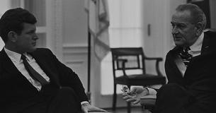 Edward Kennedy and LBJ sitting together in the Oval Office