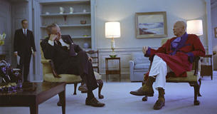 LBJ and former President Dwight Eisenhower sitting in chairs