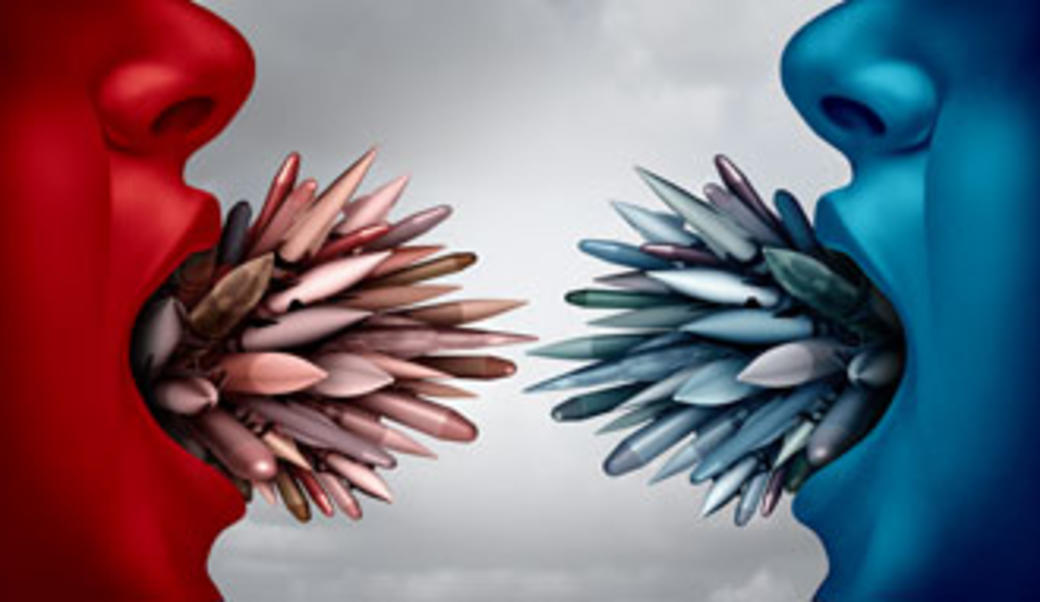Photo illustration of nuclear weapons in the mouths of two faces