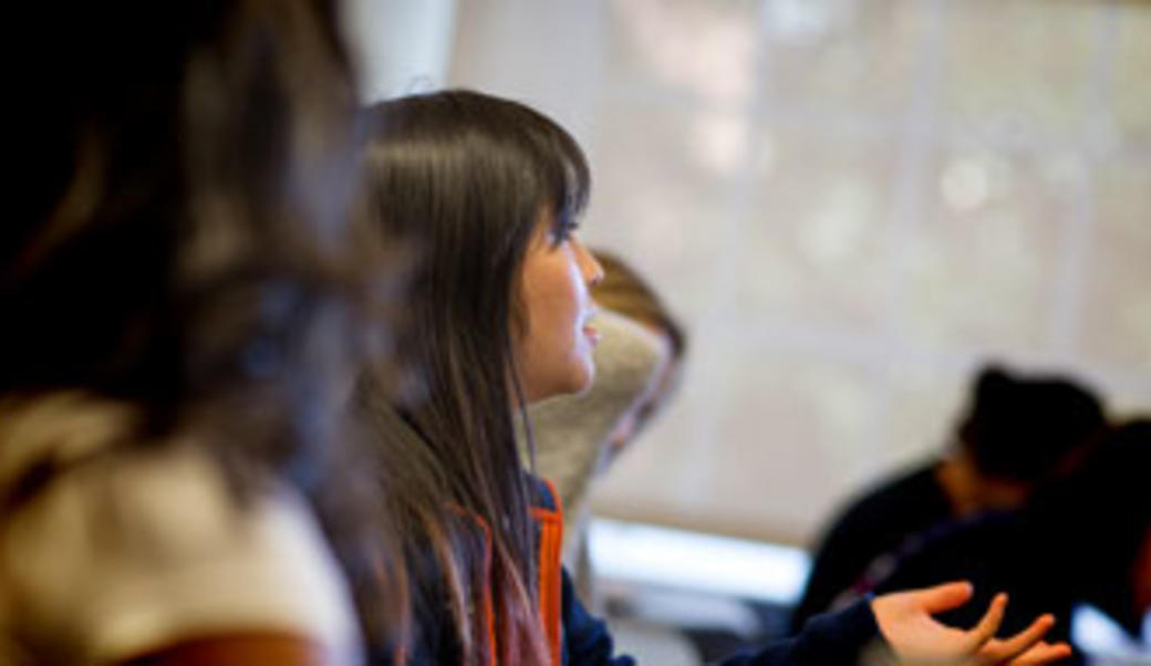 Student looking ahead to listen to a Miller Center presentation
