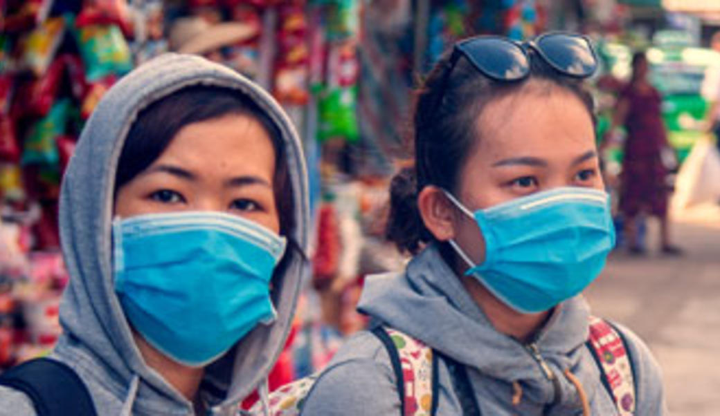 Two girls in surgical masks