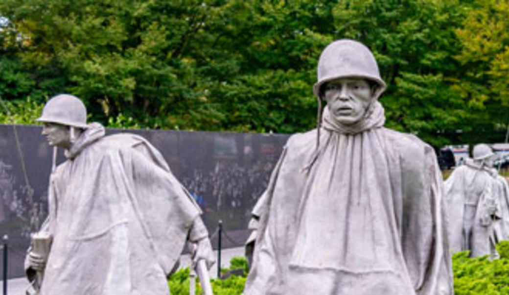 statues of soldiers in a field