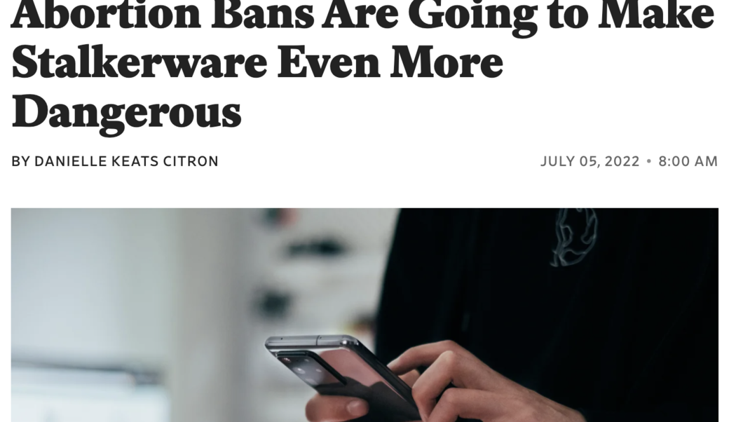 Image of hands holding cellphone