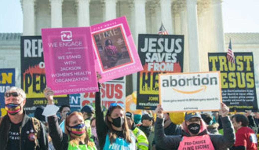 Pro life and pro choice protestors outside the Supreme Court after the Dobbs decision