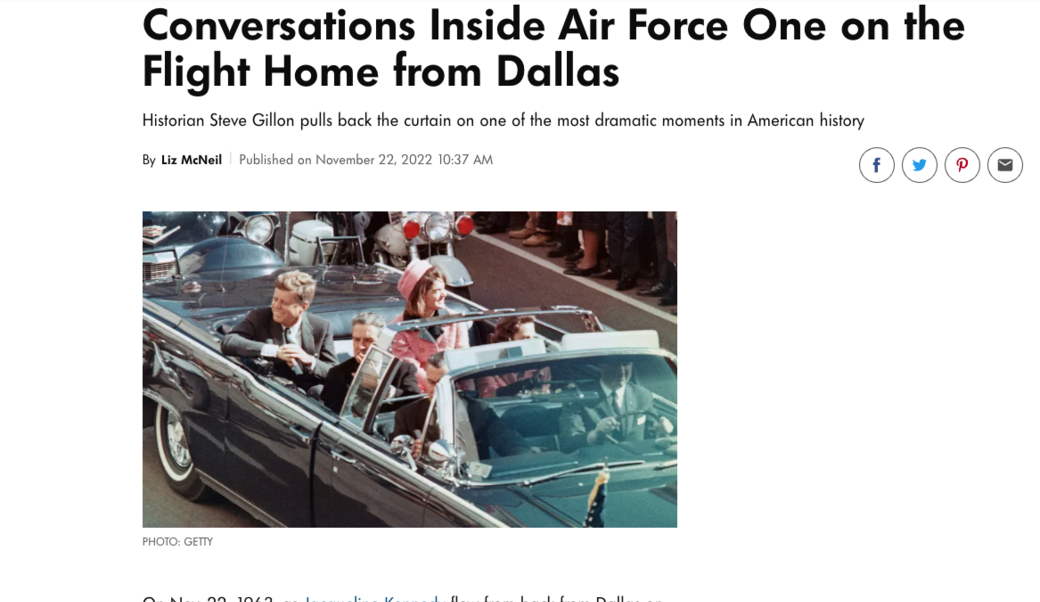 article headline and photograph of President and Mrs. Kennedy in the convertible before his assassination