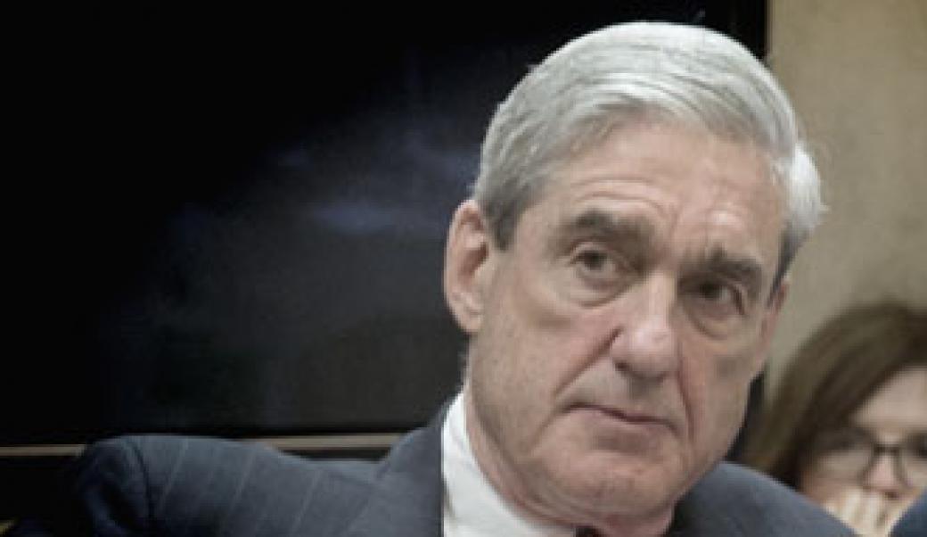 Robert Mueller in a meeting