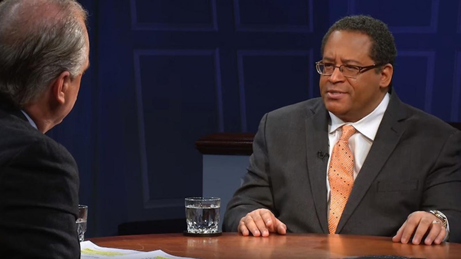 Michael Eric Dyson argues that President Obama has not pushed the nation on racial issues, instead he practiced "racial procrastination"