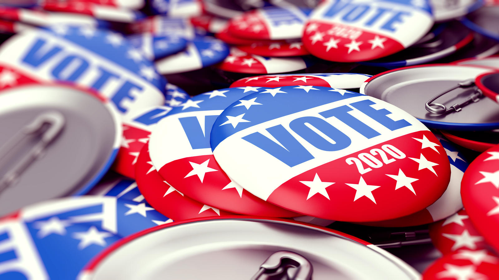 buttons and pins that say vote
